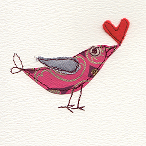 patterned paper stitched bird with red felt heart in beak handmade card