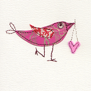 stitched paper valentine bird with fabric heart hanging from beak handmade card